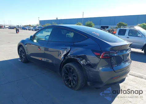 2023 Tesla Model Y Rwd из США, поврежденный, VIN 7SAYGDED5PF980101